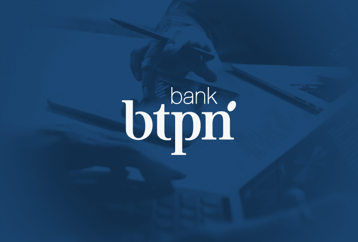 The image features the logo of BTPN bank with a background of hands working on a tablet and documents.