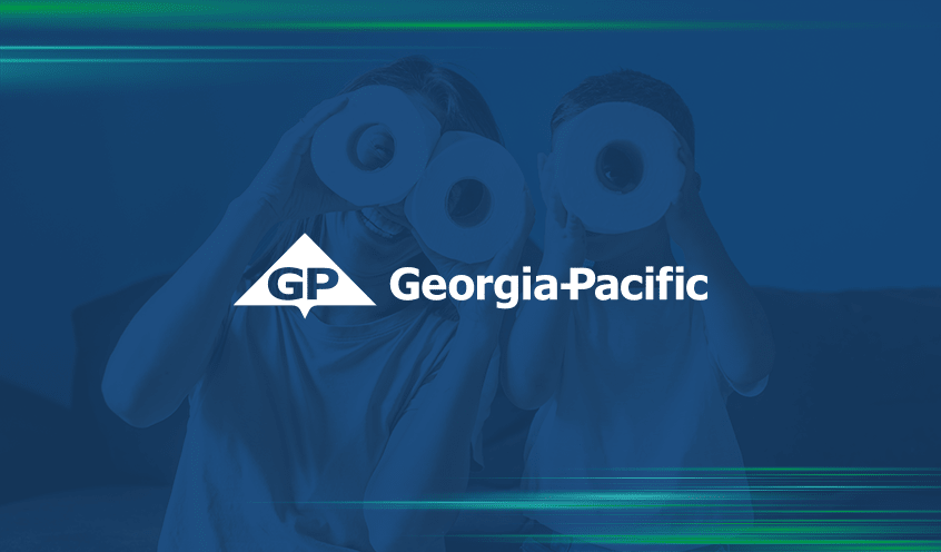 A woman and young child holding toilet paper rolls to their eyes like binoculars with Georgia-Pacific logo in the center.